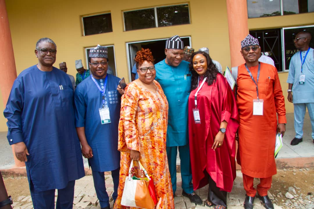 University and programme participants gathered together outside a campus venue